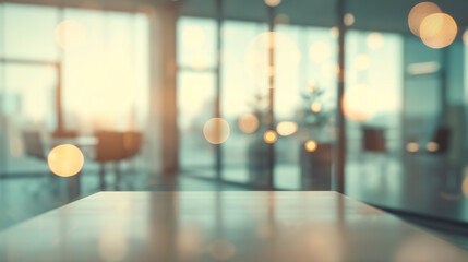 Beautiful blurred background of a light modern office interior with panoramic windows and beautiful lighting.