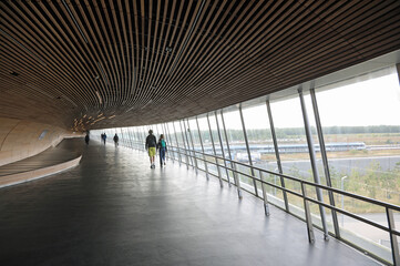 modern pedestrian overpass park and ride commuters northern europe