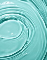 Ripples of clear blue liquid