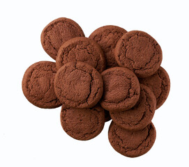 Heap of delicious chocolate cookies isolated on white background, top view.