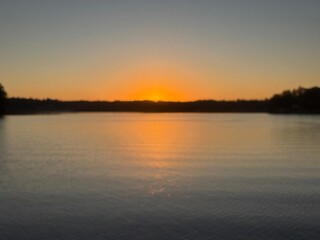 Fototapeta premium Sunset lake view summer evening water reflection