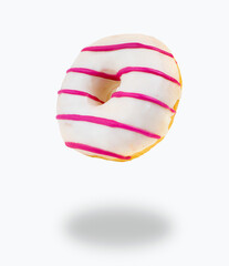 Flying donut made of  chocolate white and pink stripes with isolated on white background