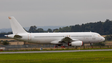 retired jet airplane at the airport. Parts being removed before scrapping