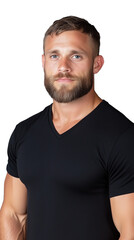 Obraz premium A muscular man in a black t-shirt posing confidently, isolated on a transparent background. Ideal for fitness and fashion themes.