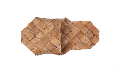 Birch bark bast shoes isolated on white background