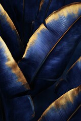 Golden and navy tropical leaves elegantly intertwined in natural light