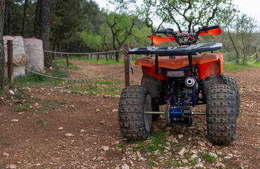 Red Quad Motorcycle in the Countryside