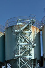 Large industrial storage tanks for use as a background