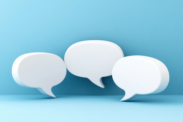 Three empty white speech bubbles on light blue background
