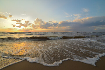 Sunrise over the sea and beautiful cloudscape.