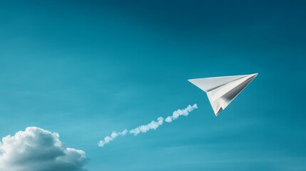 paper airplane on a clear blue sky background 