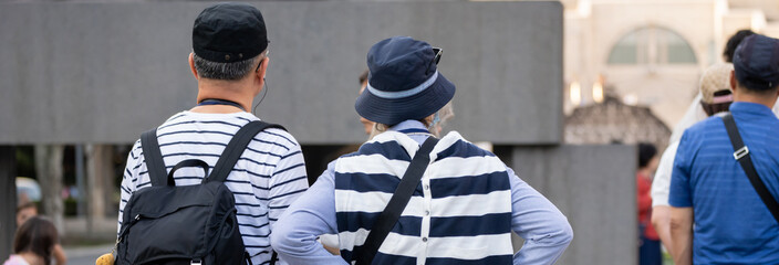 tourists exploring city sights, travel concept