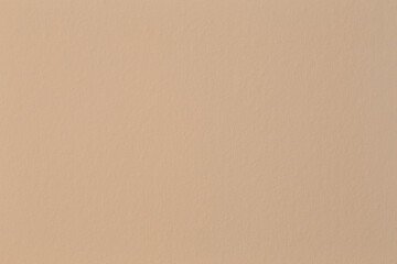 Simple beige wall texture or background