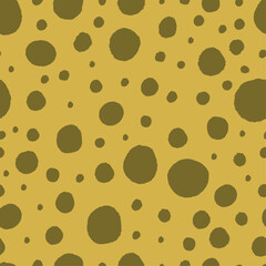 Hand drawn dots seamless pattern. Green blobs on yellow background. Abstract backdrop.