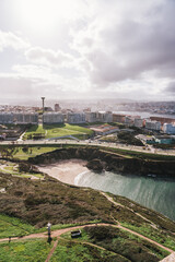 Fototapeta premium Aerial view of A Coruna cityscape from the tower of hercules with coastline and beach