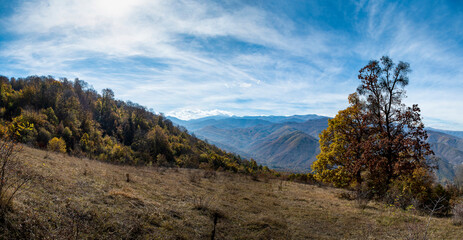 Mountain landscape in autumn. Beautiful colors of the leaves, trees and bushes. A path that leads between the forest оn mountain Kitka near the city of Skopje, Macedonia.
