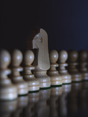 Chess pieces symbolize geopolitical and social relations. Their positions and shadows allow viewers...
