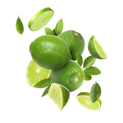 Fresh ripe limes and green leaves in air on white background