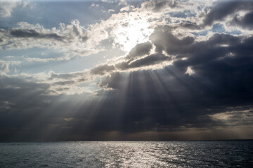 sun rays and clouds