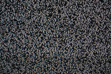 copy space , background. Old technology. Vintage television  Analog Static Noise texture. Monochrome, offset flickering noise. Screen damage TV effects and artefacts.