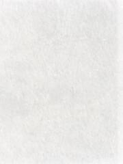 A subtle white background made of reckling paper with a few brush strokes, creating a suble pattern.	