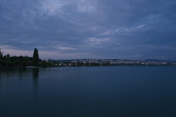 Naklejka premium clouds over the river