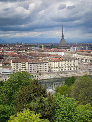 Obraz premium Scenic view cityscape of Turin, Italy seen from Monte dei Cappuccini against cloudy sky