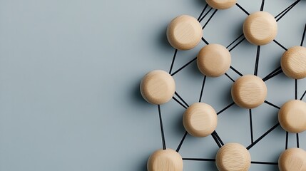 Obraz premium Wooden figures connected by black lines illustrate the concept of social and business networking against a vibrant blue background