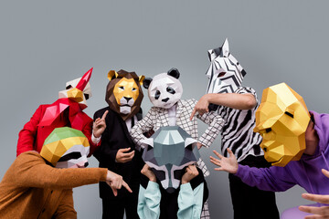 Photo of zebra gorilla lion panda sloth rooster mask people abuse point finger raccoon isolated on...