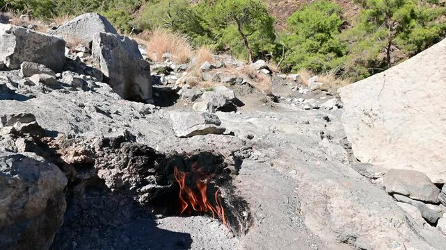 Natural flames emerge from rocks at Yanartas in Antalya&rsquo;s Olympos National Park, an ancient site with continuous fires fueled by natural gas.
