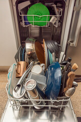  The cycle begins by filling the main tank with cold or warm water, depending on the selected...