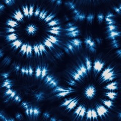 A vibrant navy blue and white tie-dye pattern featuring circular designs, creating a dynamic and artistic textile visual.