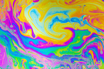 Psychedelic multicolored background abstract. Rainbow colors. patterns background. Photo macro shot of soap bubbles