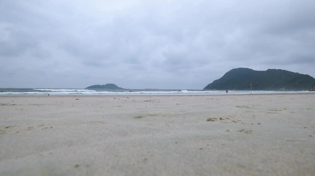 Cloudy morning at Tombo beach. Beach of Guaruja, SP, Brazil.