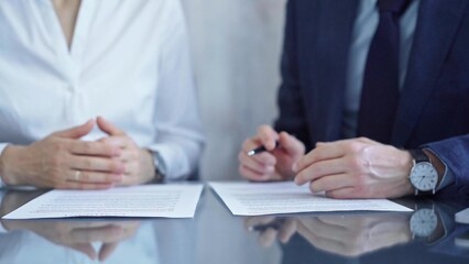 Business people having meeting discussing contract details. Diverse group team, close up