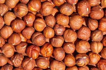 Scattered Peeled Hazelnut - Top View. Background from Hazelnuts. Natural High-Calorie Snacks