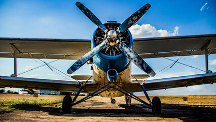 propeller on the nose of a biplane close-up