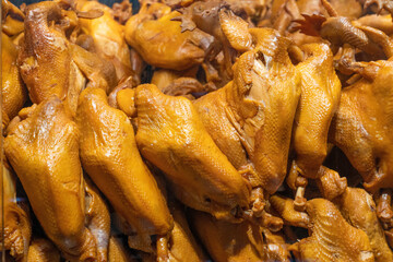 The local specialty roast chicken in the market.