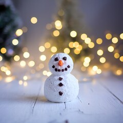 Obraz premium Festive miniature winter snowman figure illuminated by warm golden bokeh lights on white rustic wooden planks for Christmas holidays.