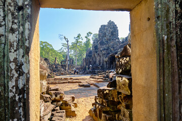 Bayon is a temple complex in the center of Angkor Thom, built in the XII century in honor of...