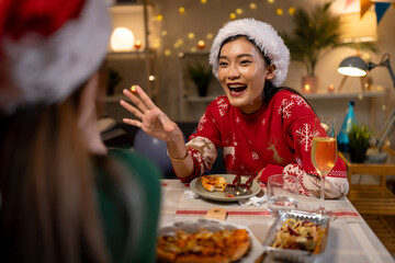 Two Asian women in room with Ciematic lighting celebrate important events such birthdays Christmas