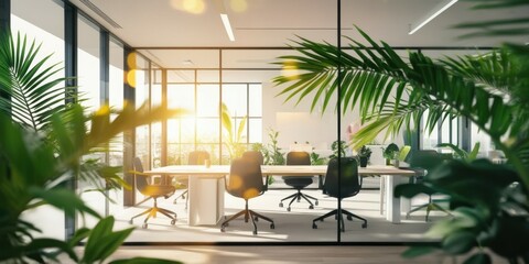 Modern office interior, sunlit workspace, glass walls, palm leaves in foreground, minimalist furniture, warm ambient lighting, clean aesthetic, open plan design, contemporary workplace, natural elemen