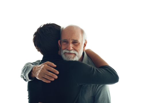 Elderly man hugging a younger man