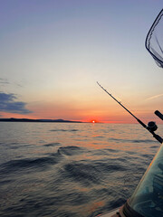 fishing in the sea lake at sunset in Michigan