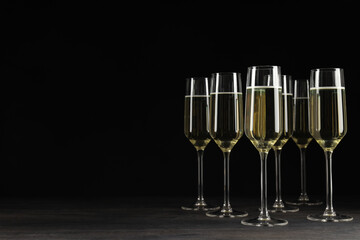 Champagne glasses on a black background