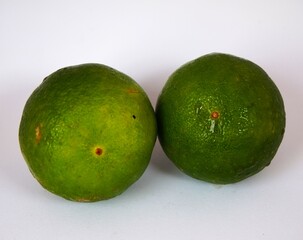 photo of fresh green lime, on white background