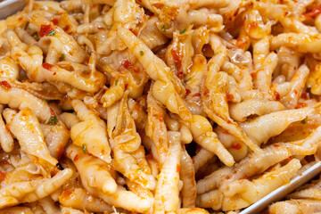 Sweet and Sour Chicken Feet with spicy seasoning.