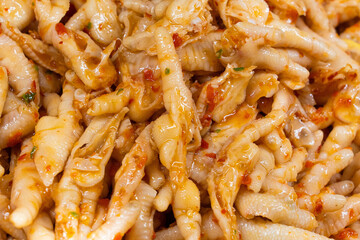 Sweet and Sour Chicken Feet with spicy seasoning.