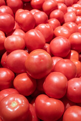 fresh ripe red tomatoes in market.