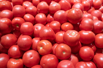 fresh ripe red tomatoes in market.